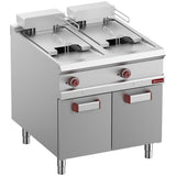 Electric fryer 2 tanks 18 liters on closed cupboard